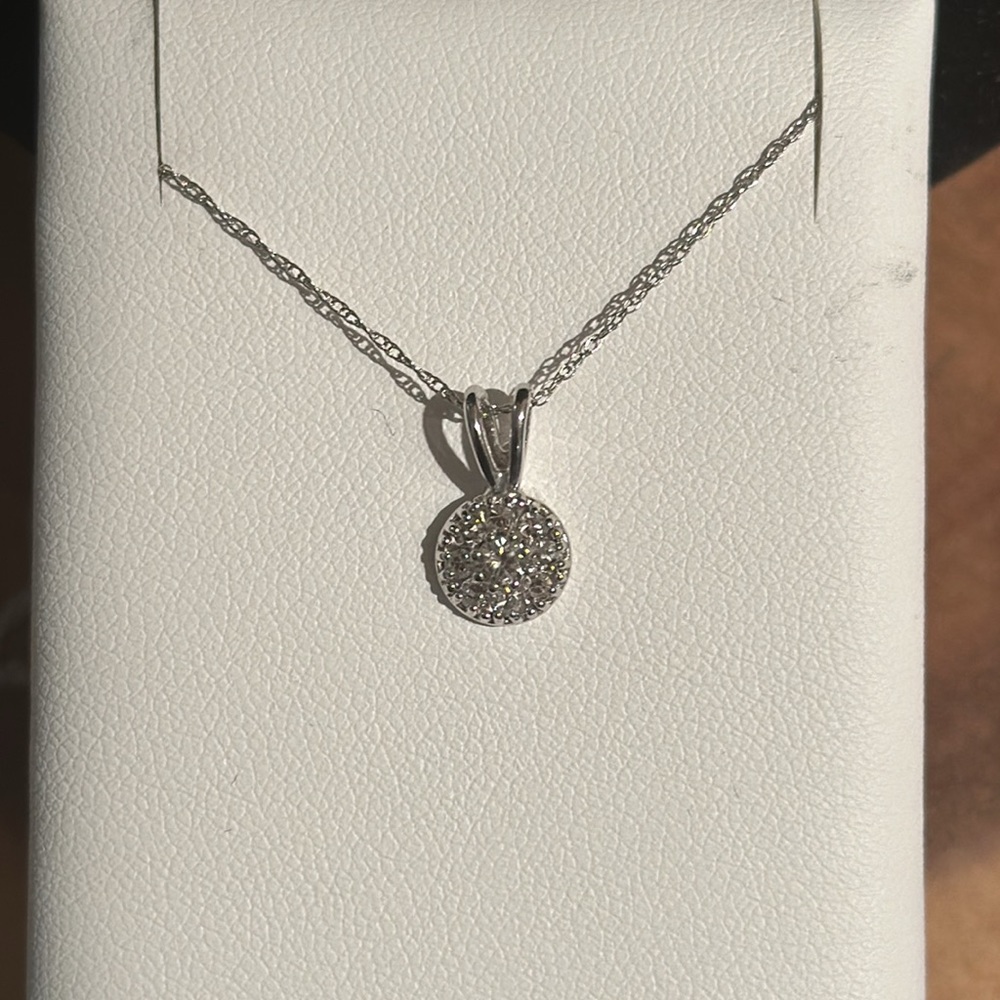 14 karat gold, halo pendant,1/4 carat Tw